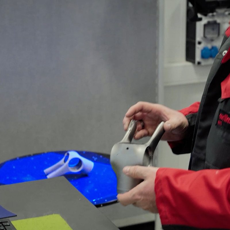 Printed part being placed for optical 3D measurement