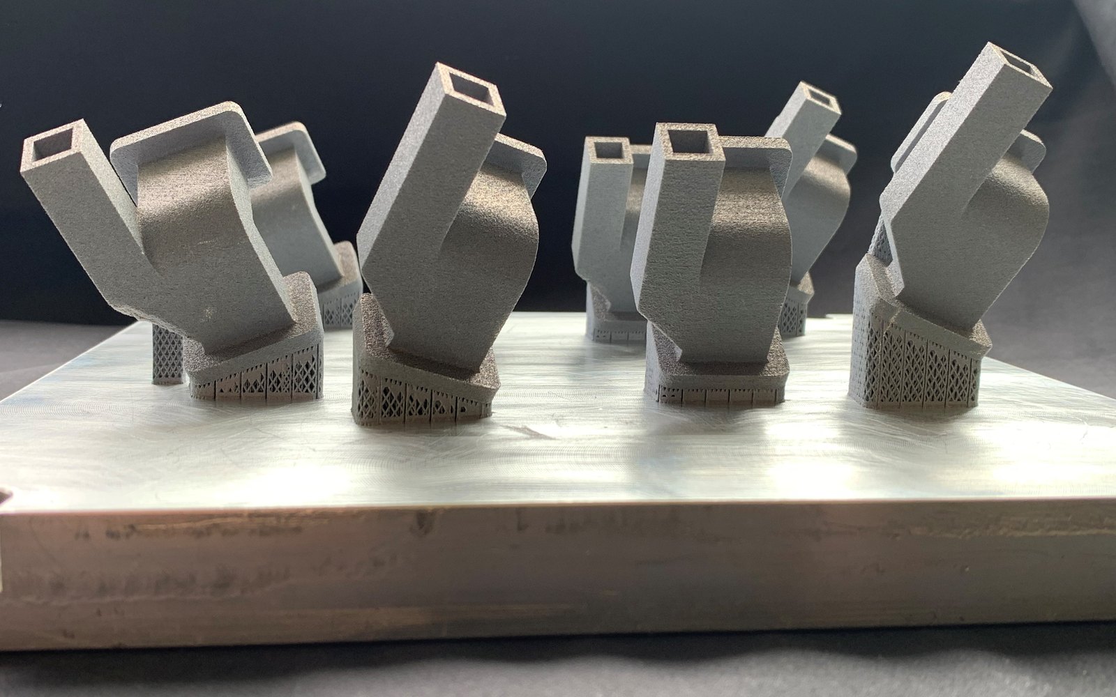 Printed waveguide antenna parts on the build plate